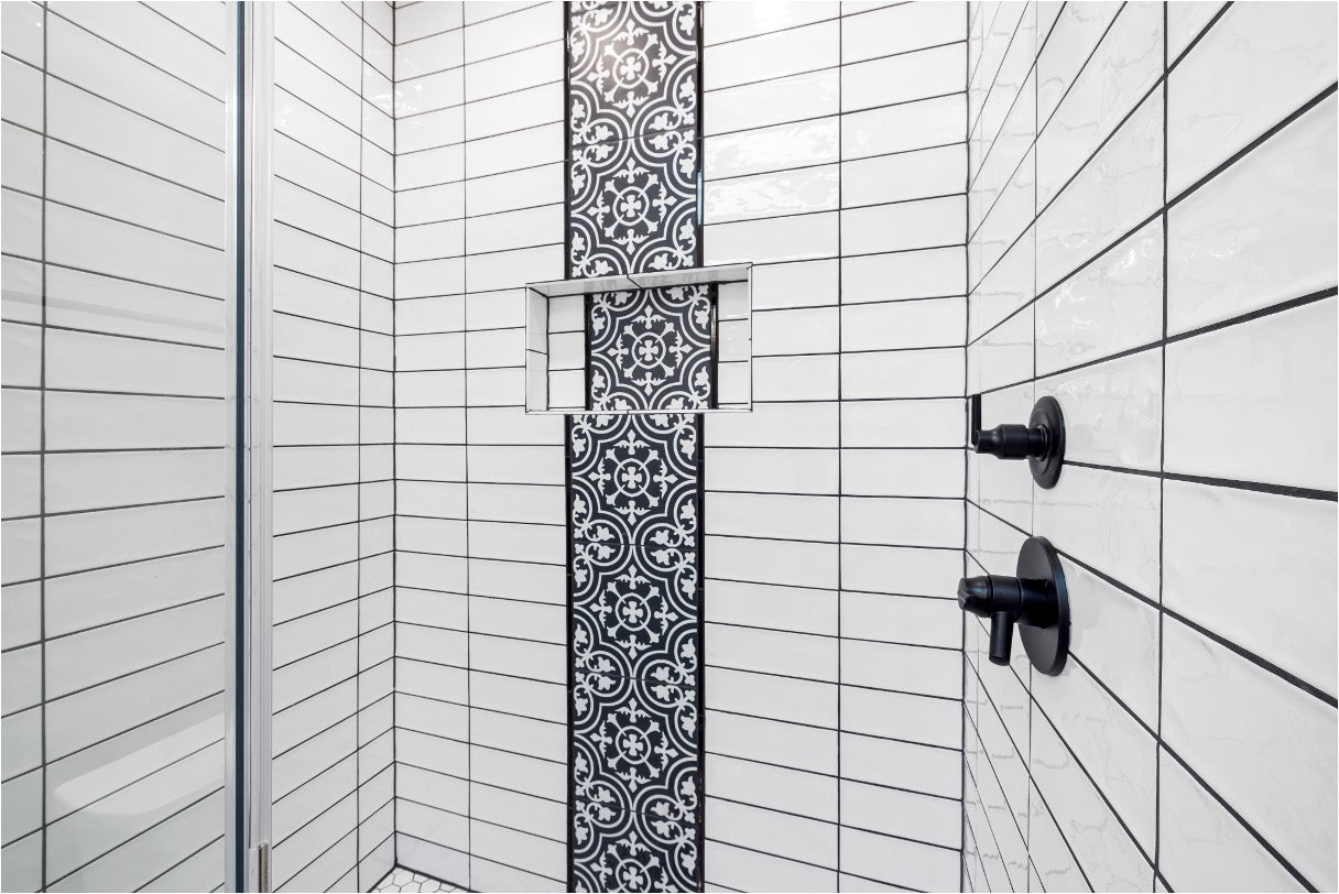 Modern shower interior with white subway tiles