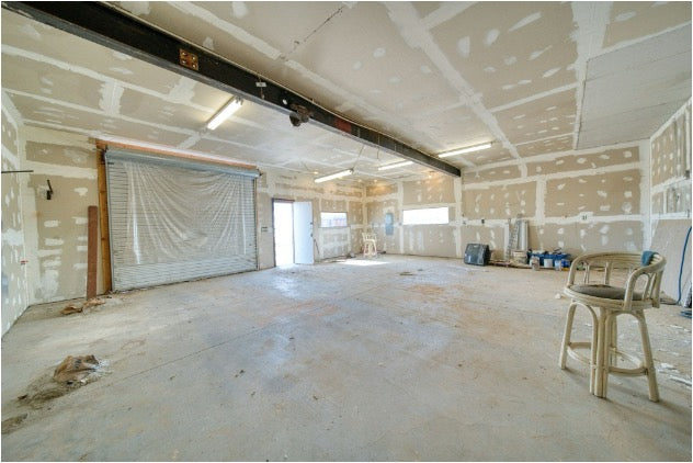 Unfinished drywall panels in a renovation project 